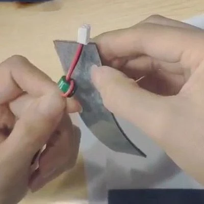 The function of wires with magnetic rings